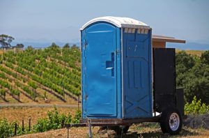 porta potty on a trailer