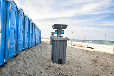 portable hand wash station on the beach